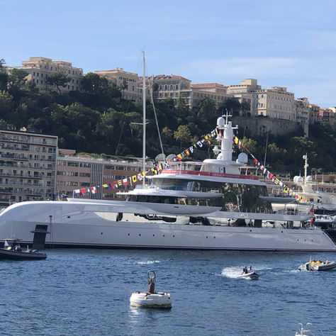 Superyacht anchored off the French Riviera showcasing luxury charter experience.