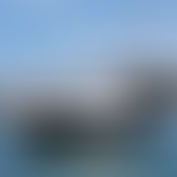 Luxury yacht cruising past Cap Ferrat from Monaco