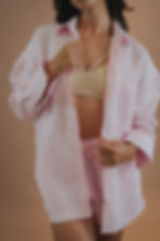 Model wearing pink Kate Shirt and Chloe Shorts linen set by Metisse Resort Wear