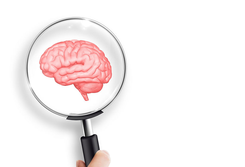 Mental health and problems with memory. Hand holding magnifying glass and brain._edited.jp