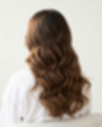 Showcase of Hair Design with wavy hair, Skin & Aesthetics facial care, and Nail Services featuring a gel manicure.