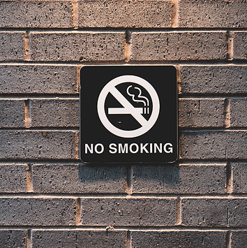 minimal shot of no smoking sign on brick wall_edited.jpg