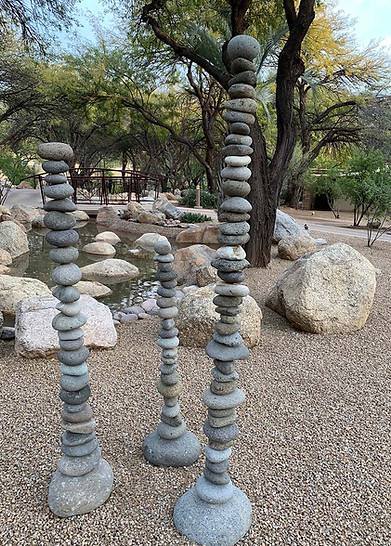 stones stacked in nature - I am Curious