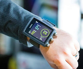 Close up of a scuba diver's wrist wearing a Suunto Eon Core computer