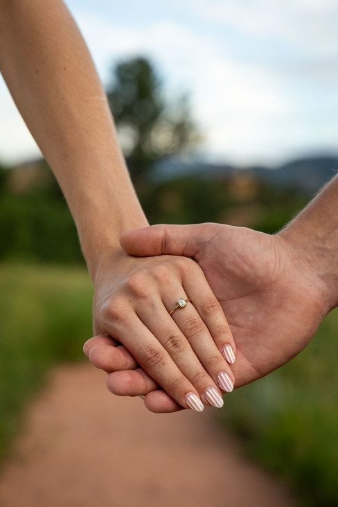 Candid moment during surprise engagement session