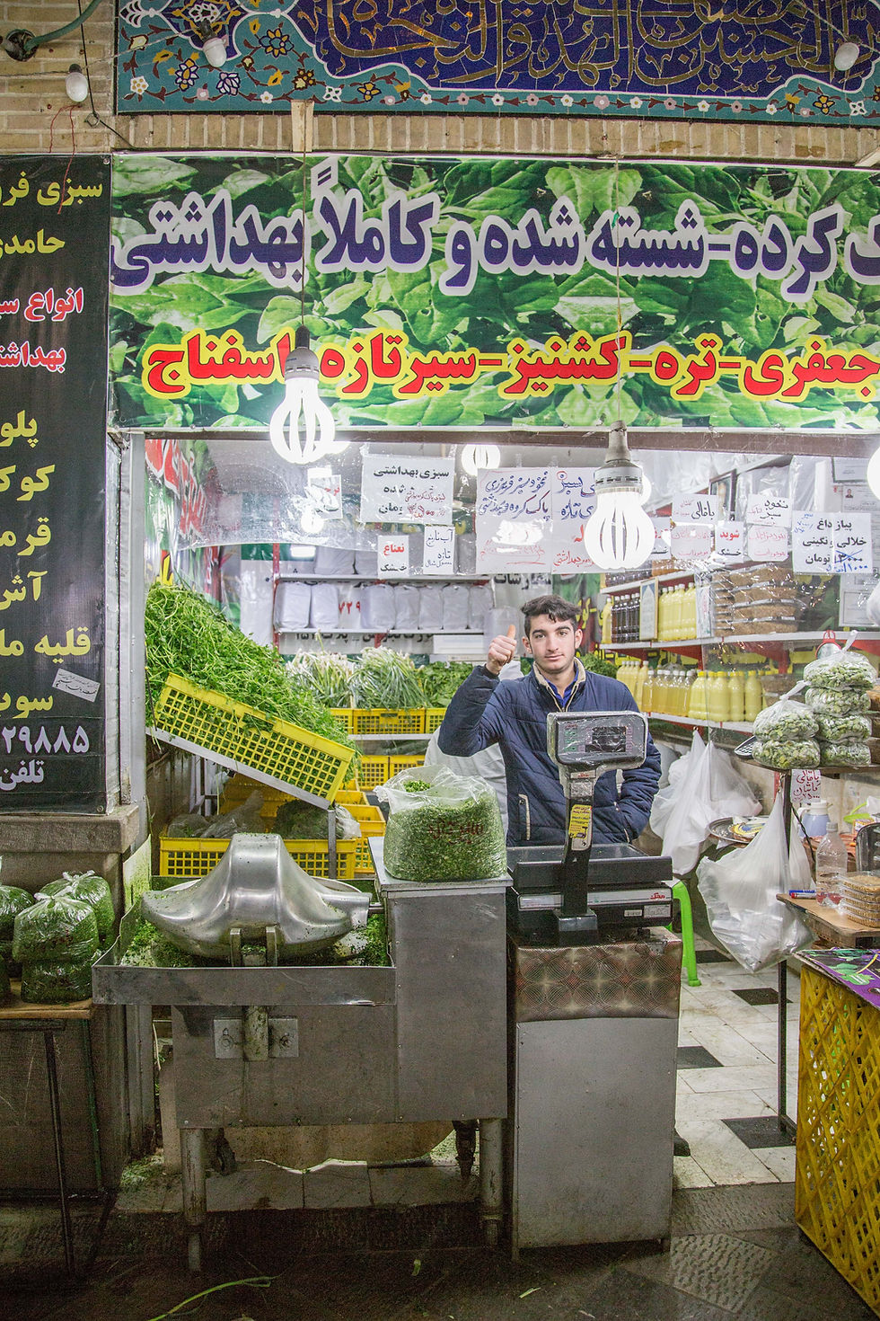 Selling fresh herbs at Tajrish Bazaar