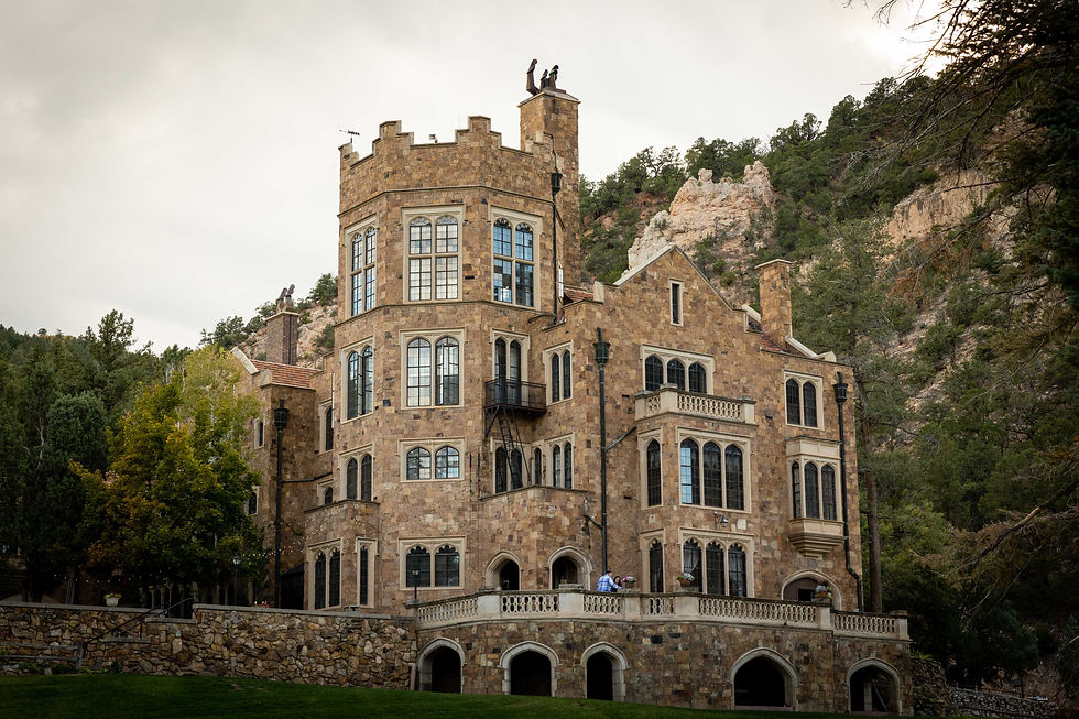 Anniversary photography session of Armando and Rebekah at Glen Eyrie Castle, featuring the castle’s historic charm in Colorado Springs.