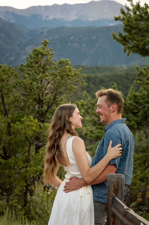 Couple engagement session in forest at Garden of the Gods