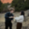 Couple laughing during an outdoor engagement session in Colorado