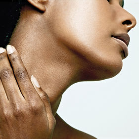 Image of woman grabbing her neck for Medical-grade botulinum toxin treatment with Trapezius Botox at DermaSculpt Toronto by nurse practitioners