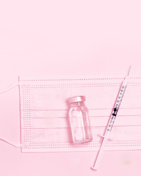 Intoduction photo of injection supplies in pink of needle, vial and mask at DermaSculpt Medical Aesthetics Clinic in Toronto