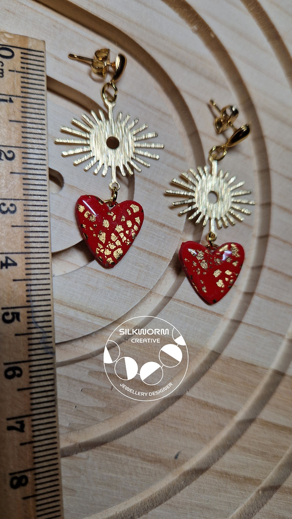 Thumbnail: Handmade Single Red Heart Earrings with Star Charm