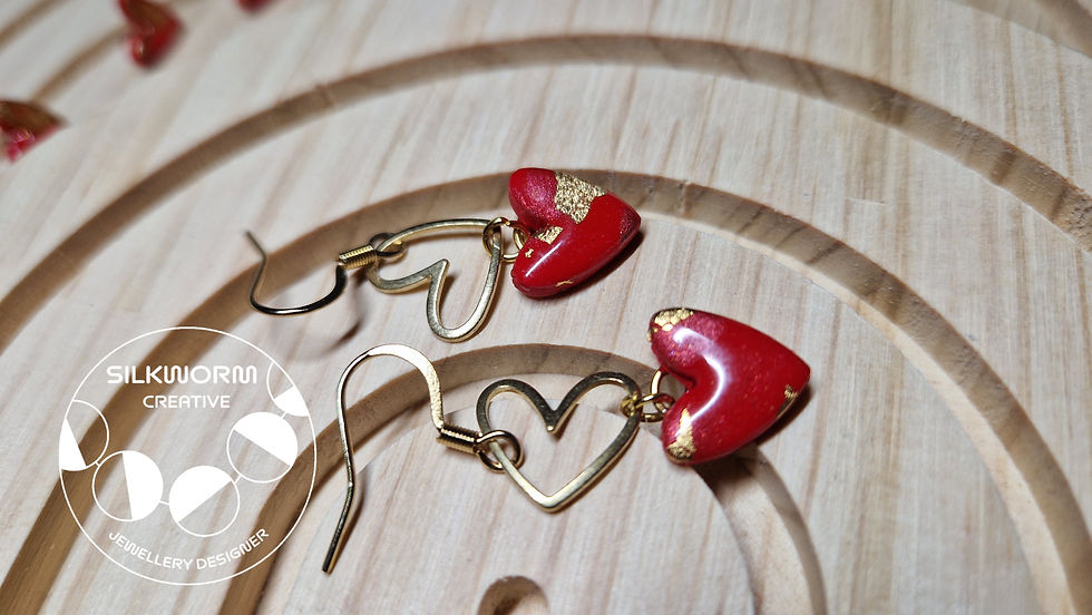Thumbnail: Handmade Double Red Heart Hook Earrings with Charm