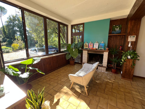 Cozy reading spot in the coworking space at a coliving in Italy near Rome.