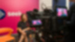 Woman being interviewed at Seek office on camera