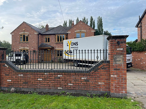Lyons Removals and Storage 7.5 tonne van outside clients house