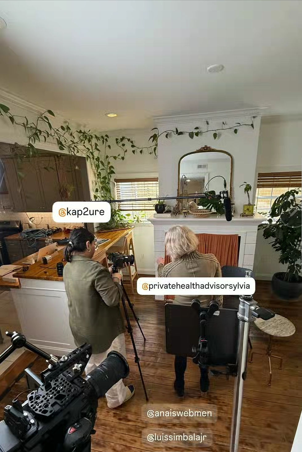 Katie Simbala, CEO-Kap2ure Film Studios takes an up close shot of Sylvia Reisman's Road ID emergency bracelet