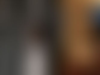 A child listening to his parents fight in the back grond