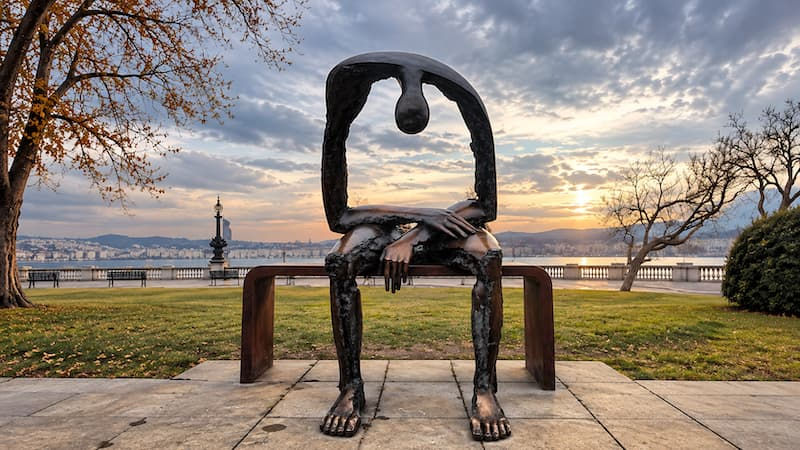 Melancholic Waterfront Sculpture at Dusk.jpg