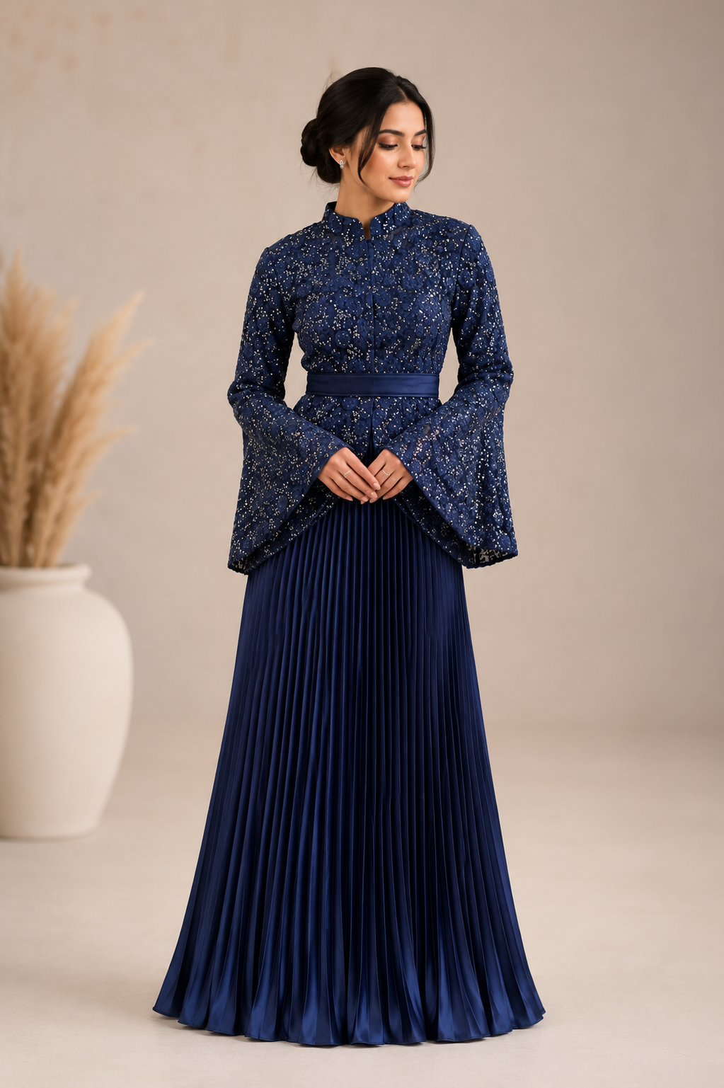 Blue lace dress with pleated skirt and bell sleeves