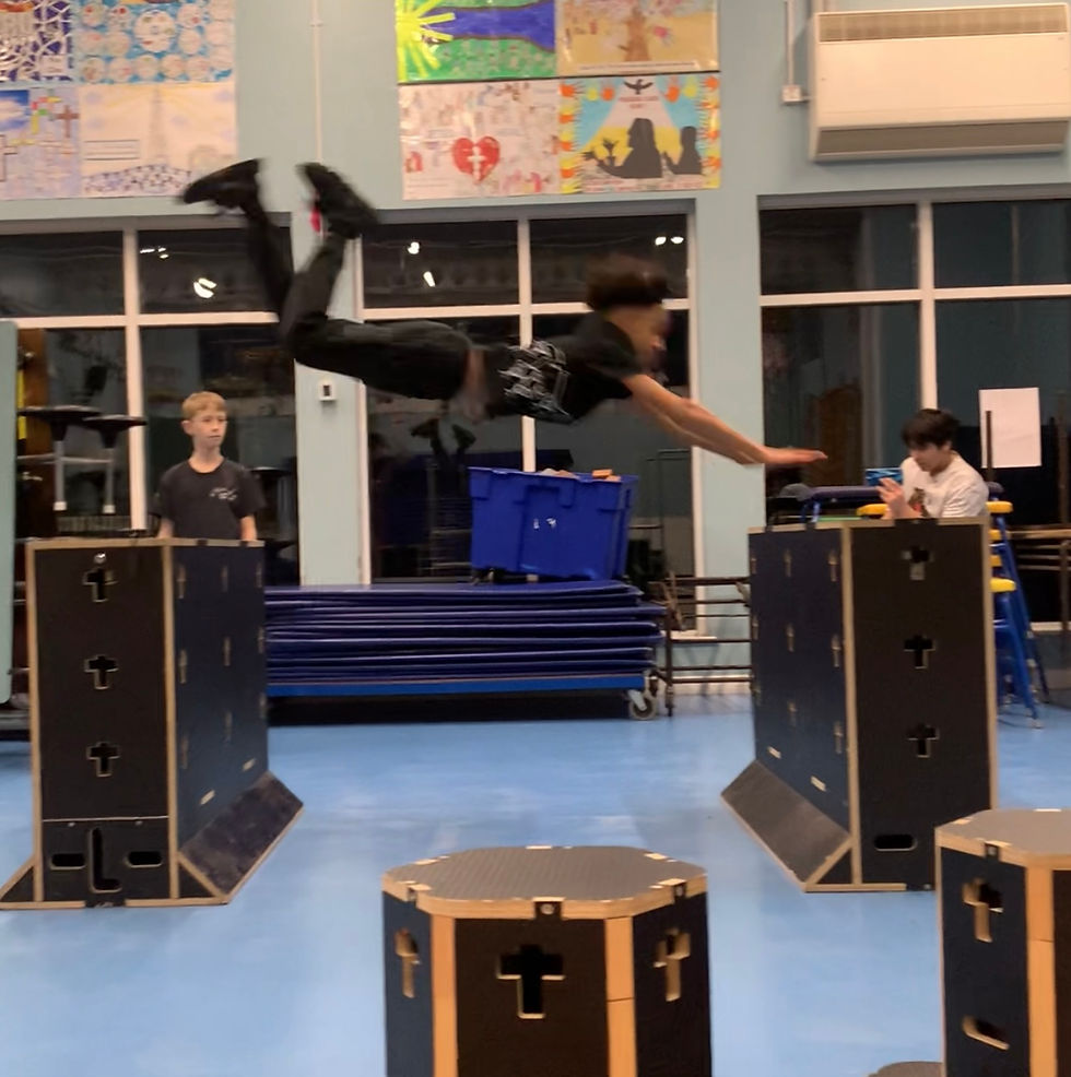 Elite Student performing a double kong vault.