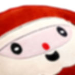Santa Claus face pillow with a red nose and smiling, happy expression.