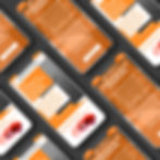 Background Image of Mobile Phones Displaying Websites Designed by Integ Creative