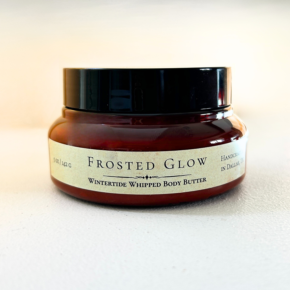 amber wide-mouthed apothecary-style jar with whipped body butter and thin vintage-style label.