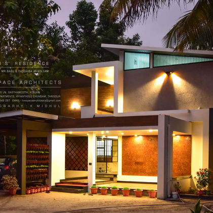 Hermin's Residence, Thrissur — modern home with timber interiors by Livespace Architects — view 2