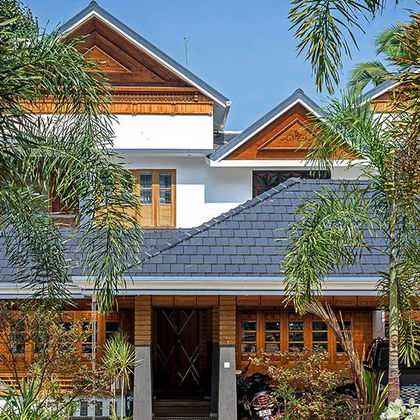 Anmat residence, Kerala — traditional roof forms with contemporary interiors by Livespace Architects — view 3