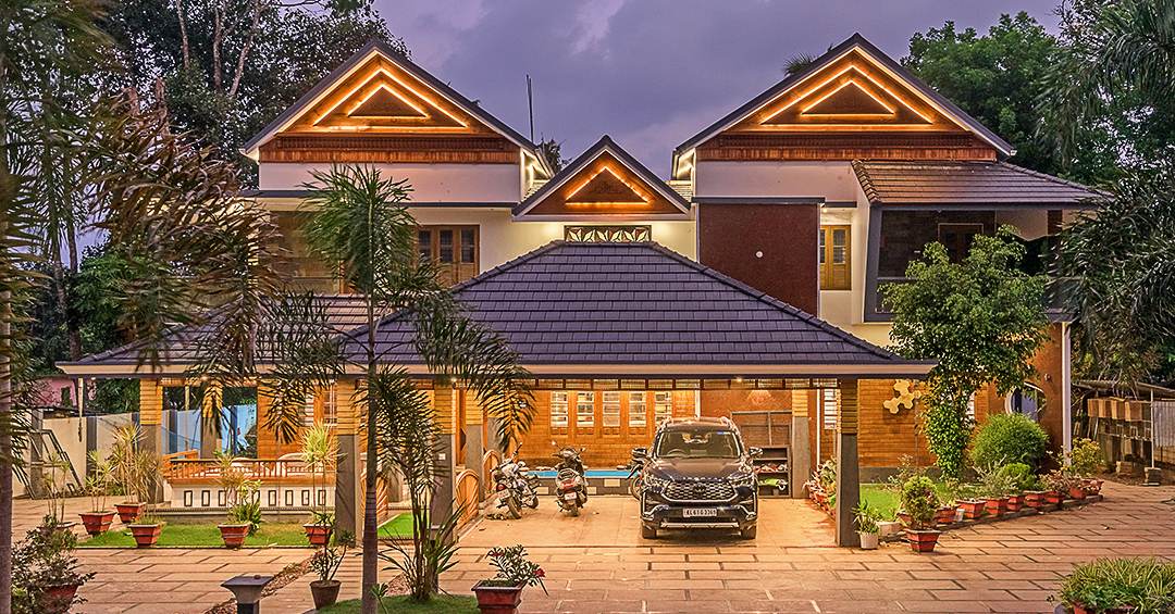 Anmat residence, Kerala — traditional roof forms with contemporary interiors by Livespace Architects
