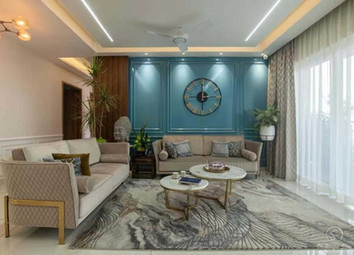 Seating arrangement positioned toward large, glazed balcony doors.