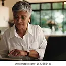 mature-woman-tablet-remote-work-260nw-2643582461.webp