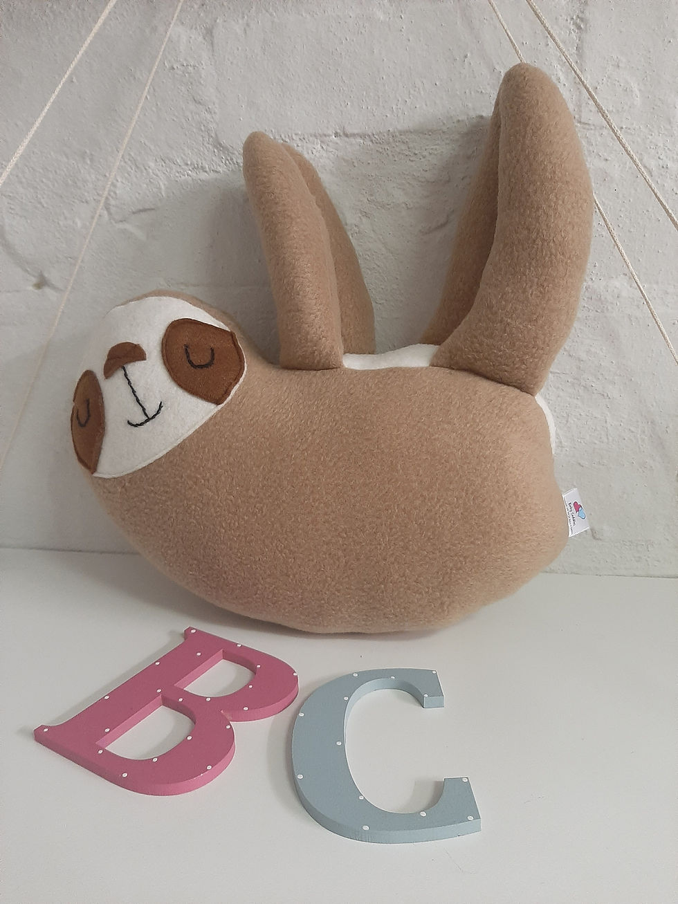 Thumbnail: Adorable sloth toy, letters B C, soft fabric