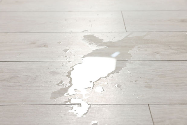 water-from-leak-on-tile-floor.jpg