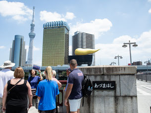 Tokyo Localized tour group at Azumabashi Bridge with Tokyo Skytree in the background