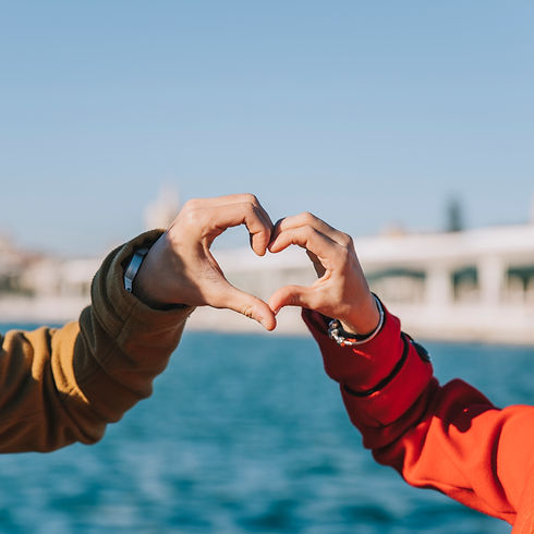 crop-couple-showing-heart-with-hands.jpg