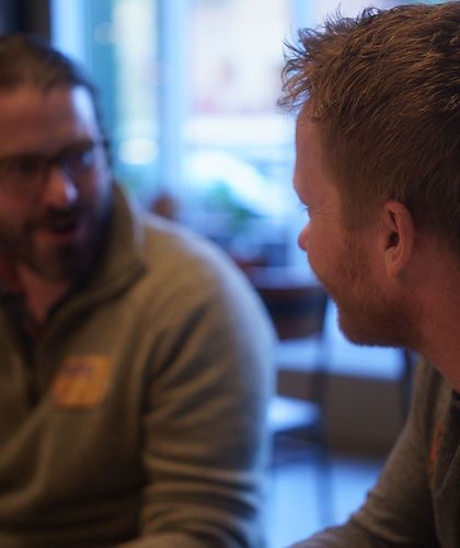 Two participants deep in conversation at an Idea Jam