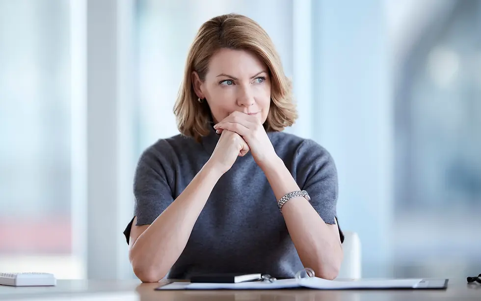 woman wearing cashmere sweater thinking