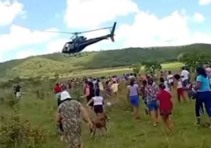 Frigorífico usa helicóptero para lançar carne a famílias carentes em Aparecida de Goiânia; cena divide opiniões