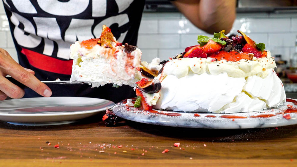 Classic Pavlova with Wine soaked Berries and Wine Strawberry Sauce