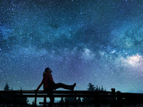 a woman stargazing