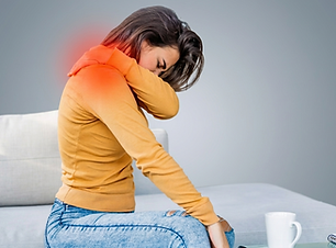 Woman feeling neck and shoulder pain
