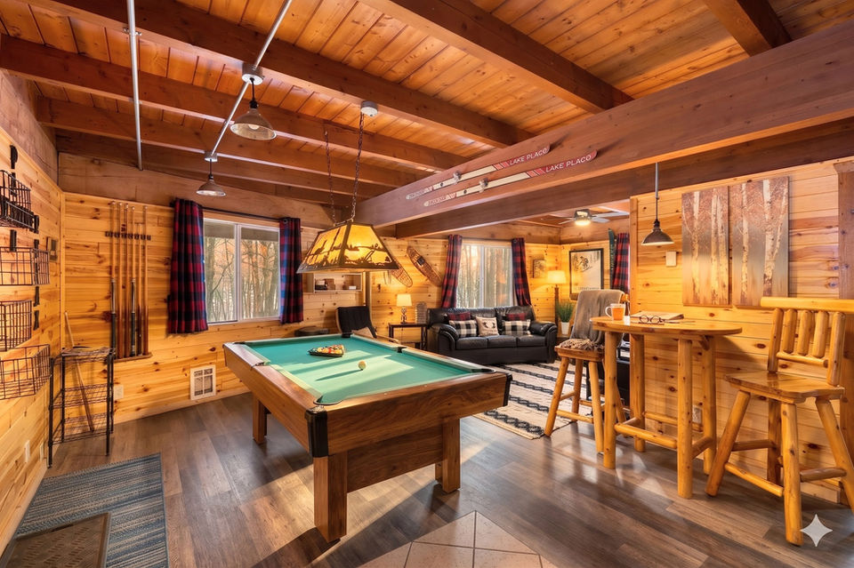 Rustic recreation room with pool table, games, and classic Up North lodge decor — perfect for groups and family vacations near Shanty Creek.