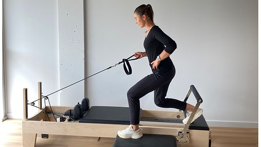 Woman building core strength in Clinical Pilates at Eastside Physio + Co