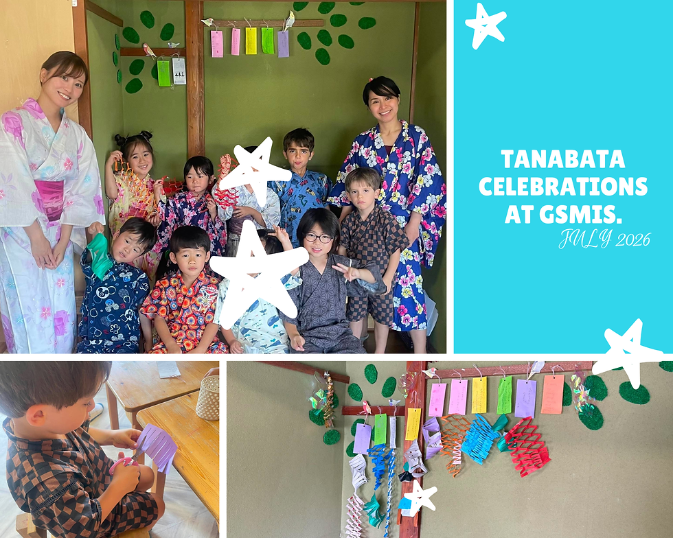 Eye-level view of colorful Tanabata decorations hanging from bamboo branches in a classroom
