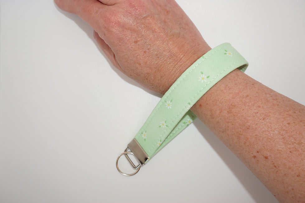 Green Floral Wristlet Keychain on wrist