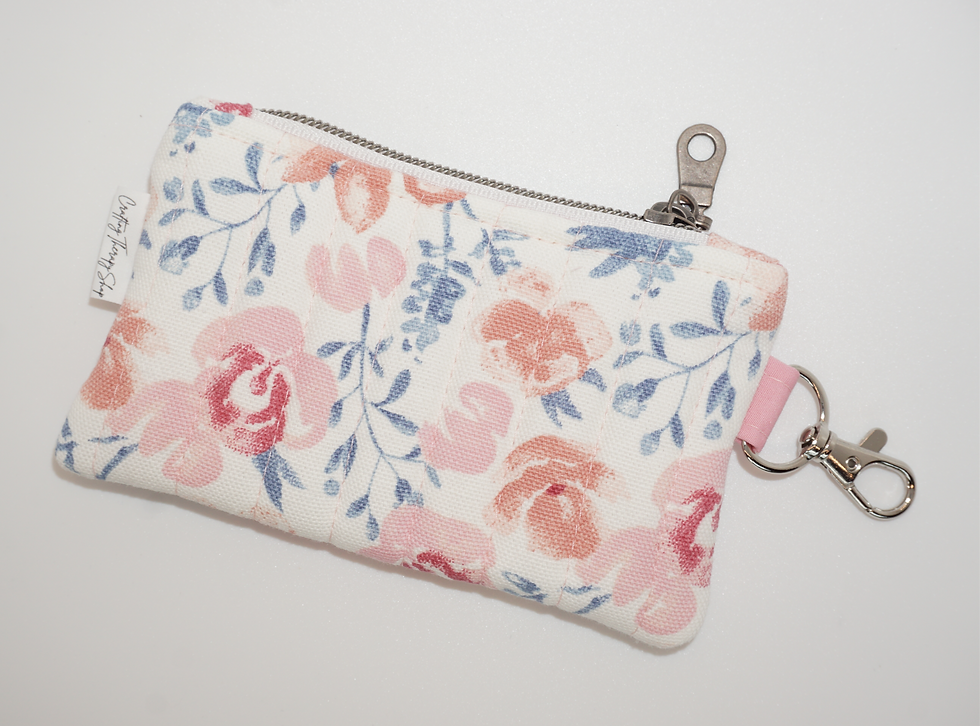 white floral quilted coin purse