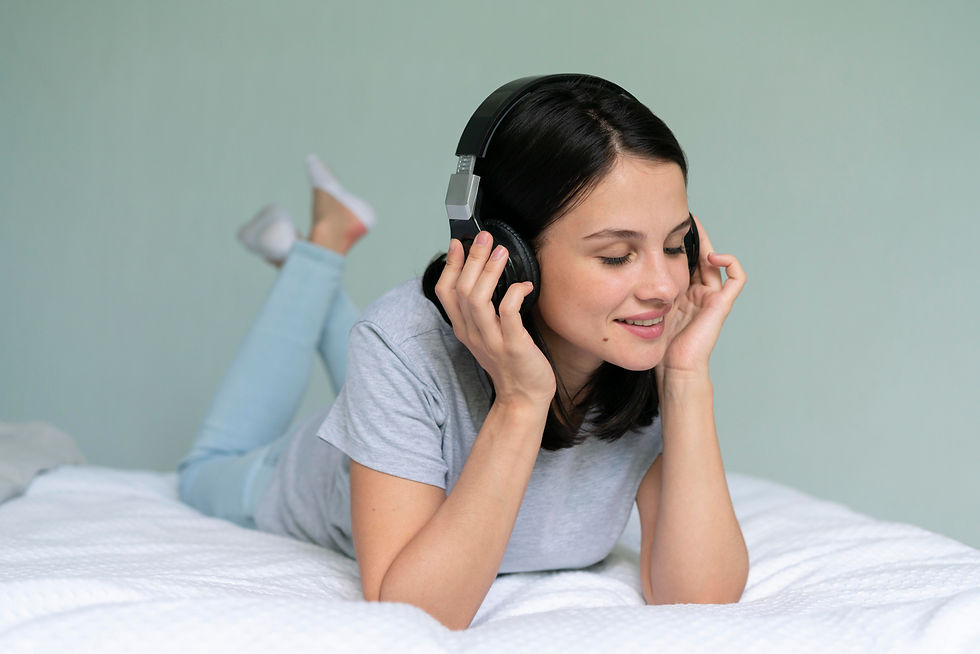 young-woman-listening-music-home.jpg