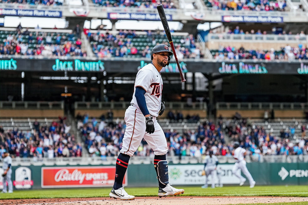 Minnesota Twins' catcher Gary Sánchez reacts to hitting a home run.